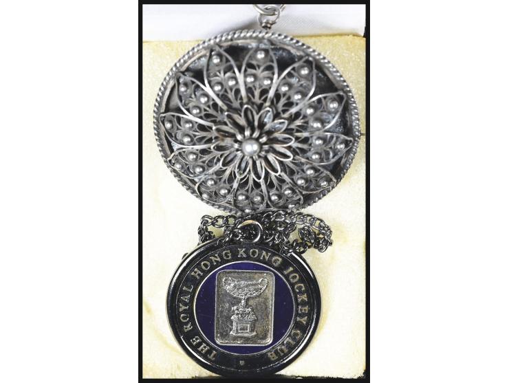 The medal is inscribed “THE ROYAL HONG KONG JOCKEY CLUB” with a central trophy motif, accompanied by its original chain and i